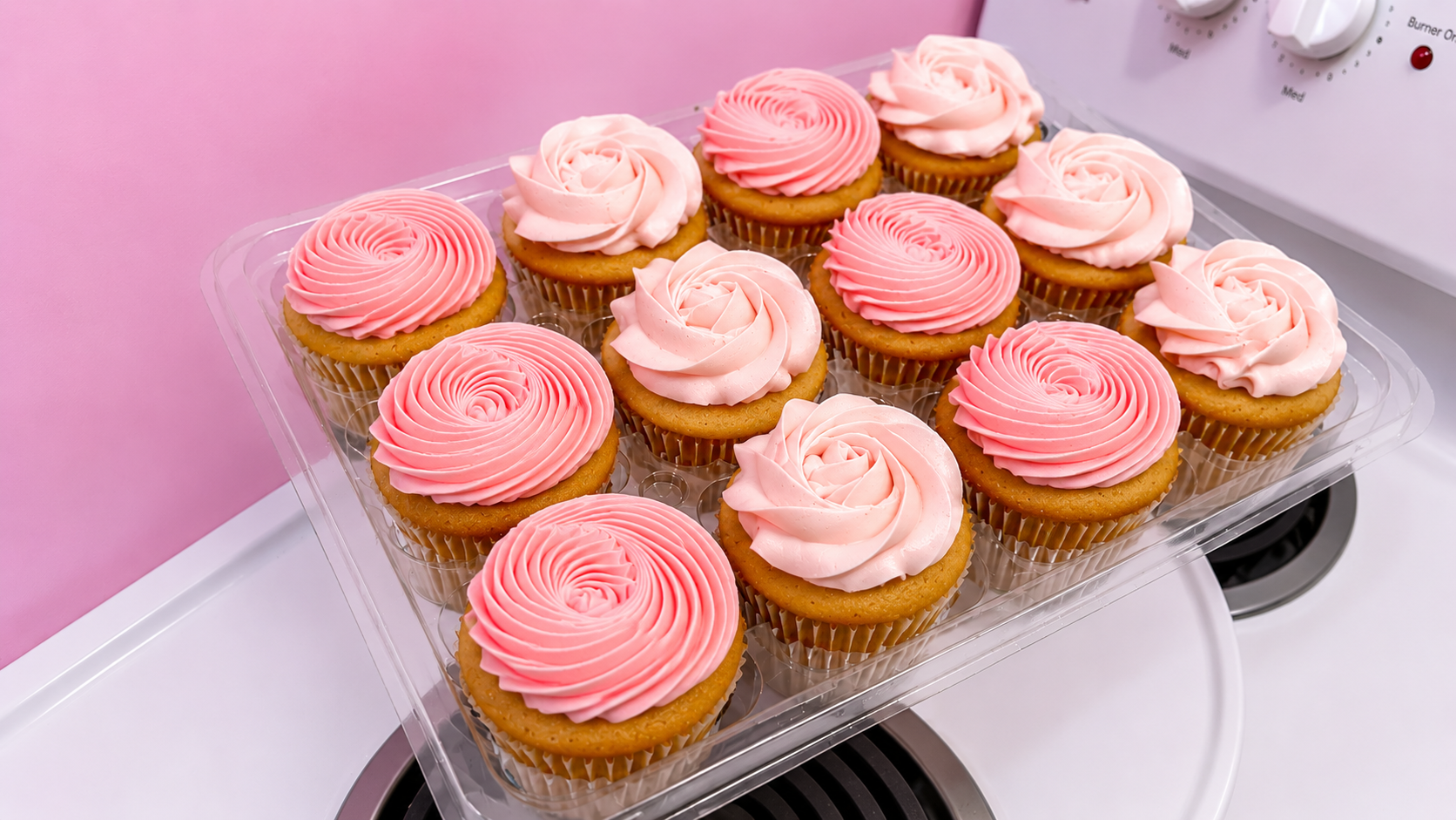 Vanilla cupcakes topped with pink buttercream rosette swirls